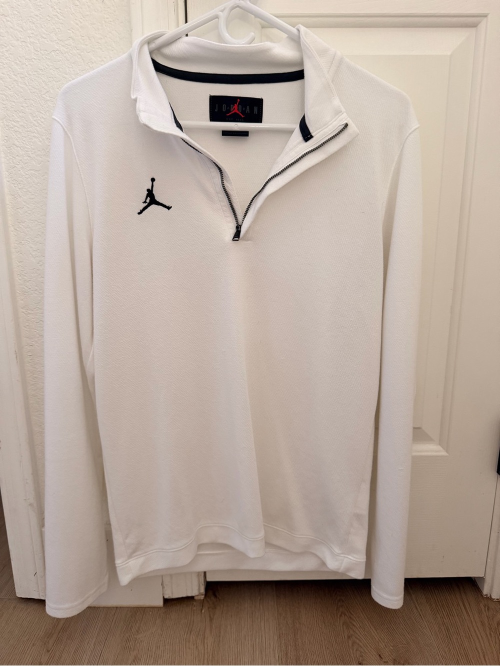 Jordan Men’s White Quarter-Zip Pullover with Black Jumpman